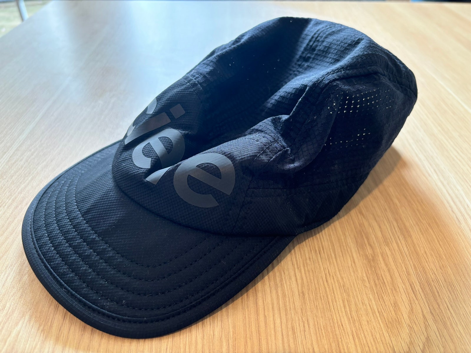 Image may contain Baseball Cap Cap Clothing Hat and Glove
